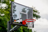 Basketball hoop with tinted backboard and Goalrilla branding against a natural background