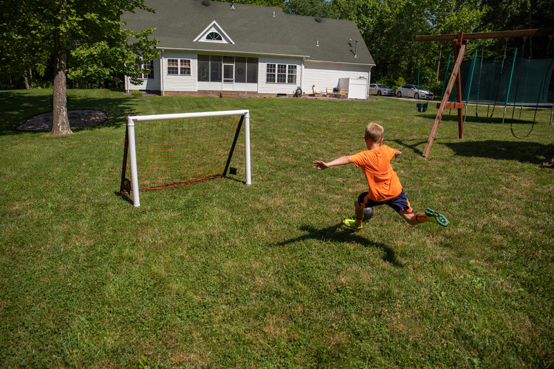 Goalrilla Gamemaker 4'x6' Inflatable Outdoor Soccer Goal - Kid Playing Soccer