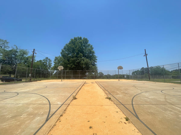 outdoor basketball court in Torrey Craig's hometown of Great Falls, South Carolina, before the renovation