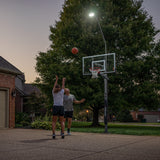 Goaliath LED Basketball Hoop Light - Two Kids Playing Basketball at Night