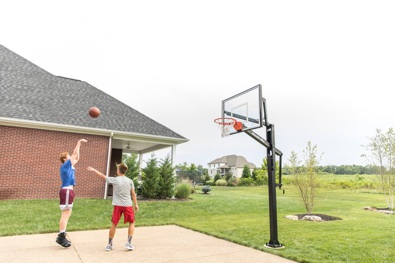Goalrilla In Ground Basketball Goal - FT54 - 54" Backboard - Kids Playing on Home Court