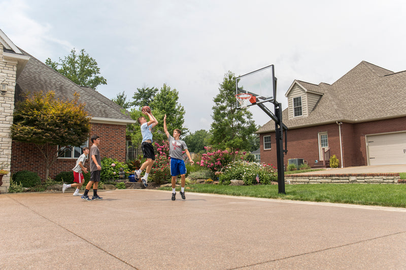 Goalrilla In Ground Basketball Goal - FT60 - 60" Backboard - Kids Playing at Home Court