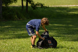 Goalrilla Gamemaker 4'x6' Inflatable Soccer Goal - Boy Getting Goal out of Bag