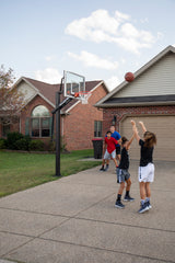 Goalrilla In Ground Basketball Goal - GS54C - 54" Backboard - Kids Playing on Home Court