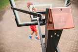 Goalrilla STBLZR Box — 60" CV - Left Side Top View with Kid Shooting Basketball 