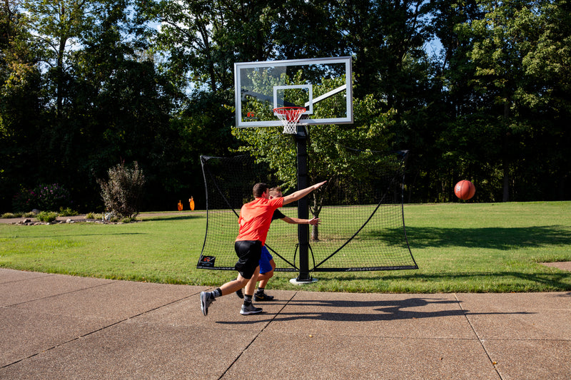 Goalrilla Yard Guard - Basketball Yard Guard - Two Boys Playing